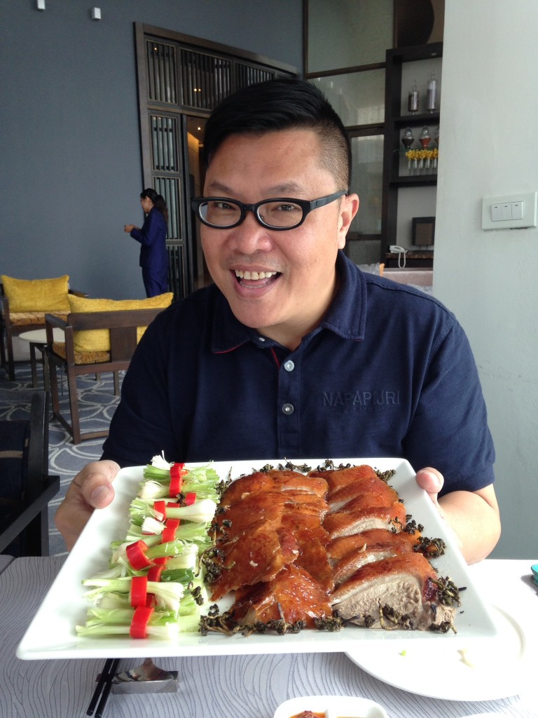 Roger Wu, a famous food critic, enjoyed Silver Waves Tea Infused Peking Duck