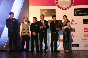 Mr Brian & Club Rizzoli team accept Award from Ms Myat Thiri Aung (Rep of Interlocal Exim Pte,ltd